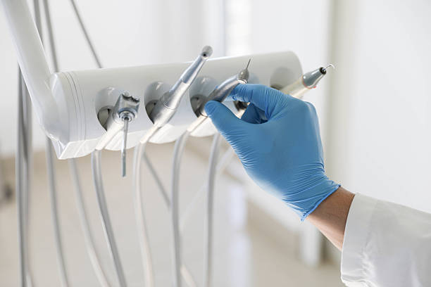 Professional Tooth Extraction technician working in Cloverdale, IN